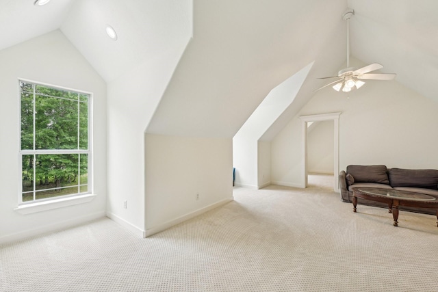 bonus room with a ceiling fan, baseboards, carpet, and vaulted ceiling