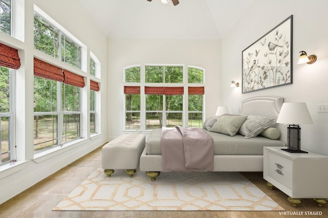 12061 Oak Forest Ln, Conroe, TX 77385 - bedroom with a towering ceiling and tile patterned flooring