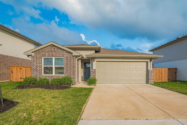 ranch-style home with fence, a garage, a front yard, and brick siding