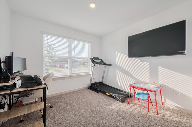 carpeted office with baseboards
