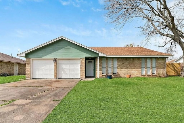 single story home featuring a garage, fence, a front lawn, concrete driveway, and brick siding