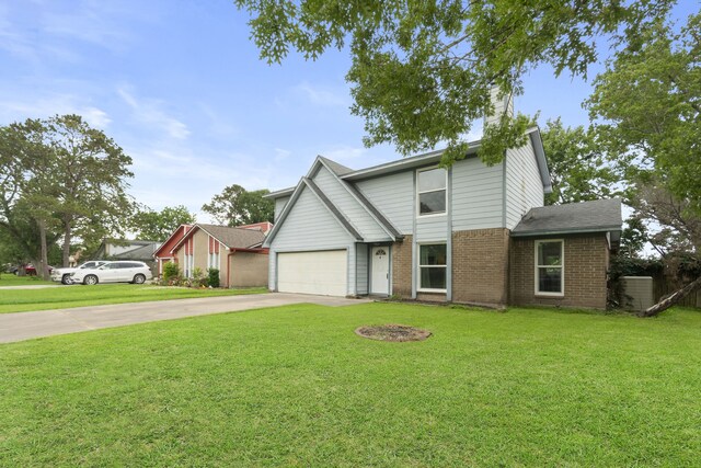 traditional home featuring brick siding, a garage, driveway, and a front yard