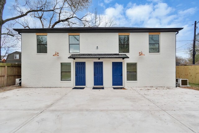 1747 Forest Hill Blvd, Houston, TX 77023 - back of property featuring brick siding and central air condition unit
