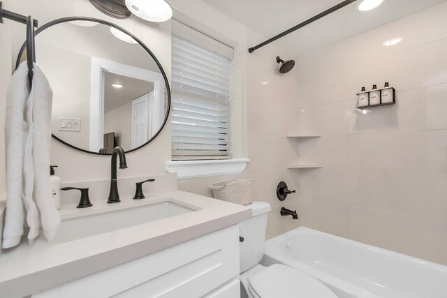 1747 Forest Hill Blvd, Houston, TX 77023 - full bath with vanity, shower / bathtub combination, and toilet