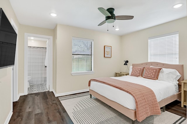 bedroom with connected bathroom, wood finished floors, baseboards, ceiling fan, and recessed lighting