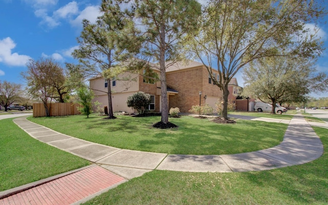 1211 Reedpoint Dr, Houston, TX 77090 - view of property exterior featuring brick siding, an attached garage, a lawn, and fence