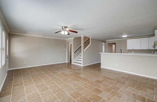 1211 Reedpoint Dr, Houston, TX 77090 - unfurnished living room with a ceiling fan, baseboards, ornamental molding, and a textured ceiling