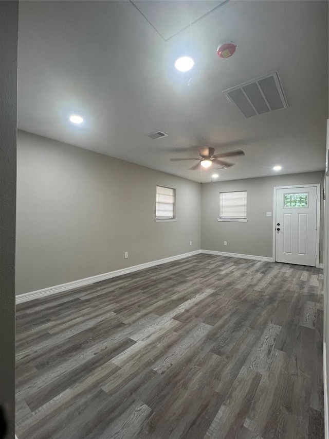 4409 Saint Goar St, Dickinson, TX 77539 - spare room featuring a ceiling fan, dark wood-style floors, baseboards, attic access, and recessed lighting