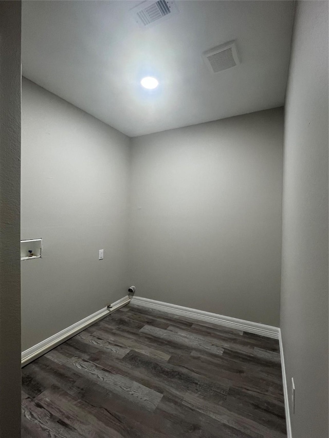 4409 Saint Goar St, Dickinson, TX 77539 - laundry area with wood finished floors, washer hookup, and baseboards