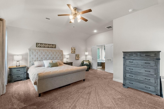 carpeted bedroom featuring visible vents, baseboards, ensuite bath, and vaulted ceiling
