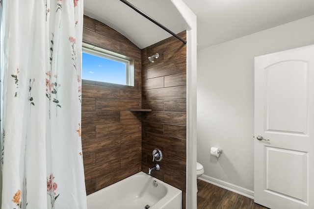 full bath featuring wood finished floors, baseboards, toilet, lofted ceiling, and shower / bathtub combination with curtain