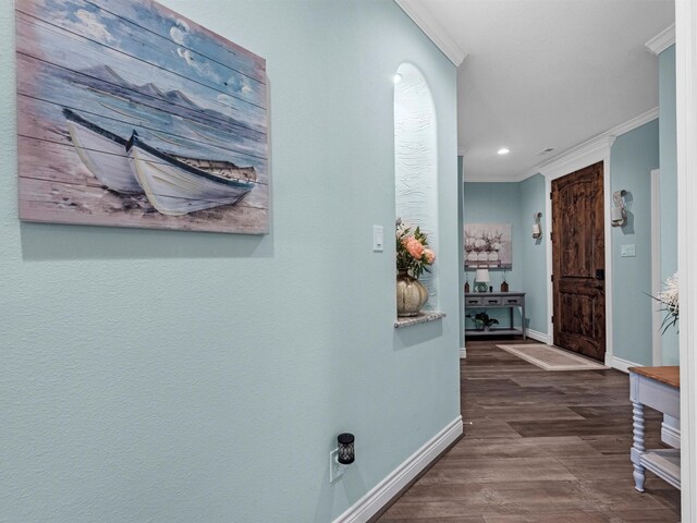 hall featuring recessed lighting, baseboards, dark wood finished floors, and ornamental molding