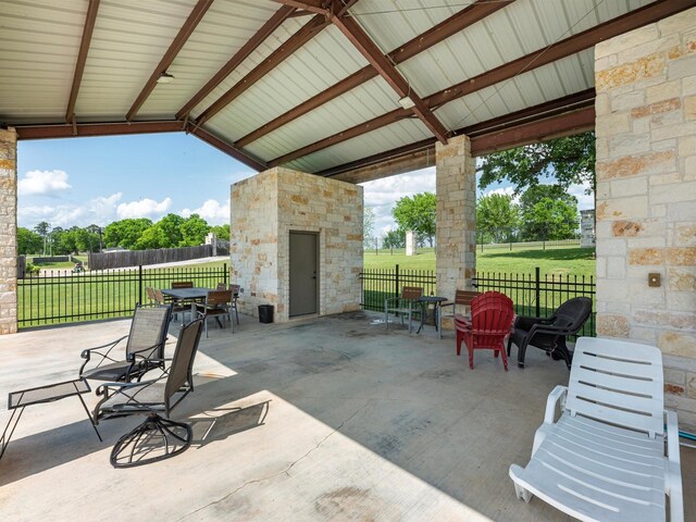 view of patio / terrace featuring fence and outdoor dining space