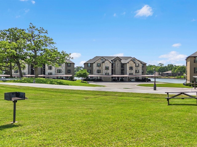 2112 Fm 3186 Unit C4, Onalaska, TX 77360 - surrounding community featuring parking, a residential view, and a lawn