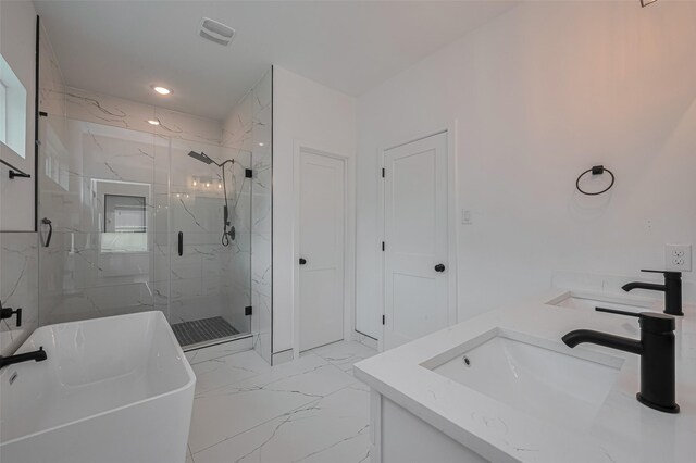 bathroom with a sink, a marble finish shower, marble finish floor, visible vents, and a soaking tub