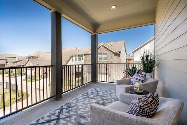balcony featuring a residential view