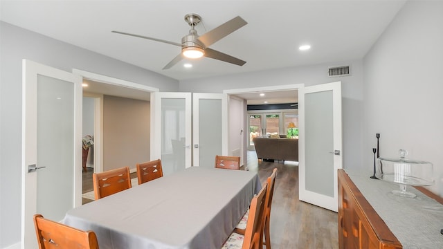 dining area featuring visible vents, ceiling fan, recessed lighting, light wood-type flooring, and french doors