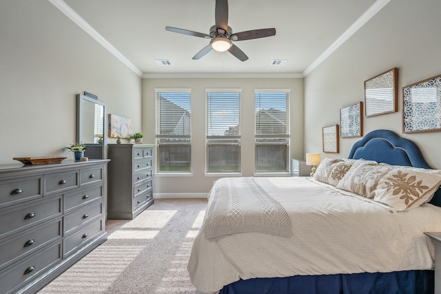 bedroom with baseboards, ornamental molding, light carpet, and visible vents