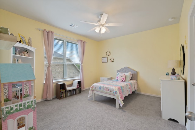 bedroom featuring carpet flooring, a ceiling fan, baseboards, and visible vents