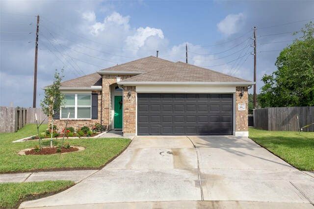 ranch-style home featuring brick siding, fence, and concrete driveway