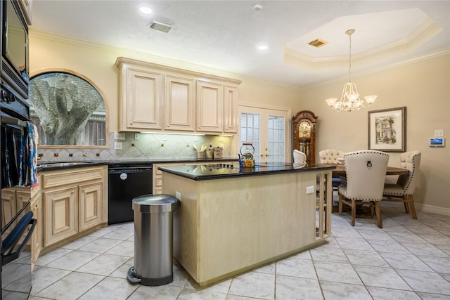 8010 Fonthill Dr, Spring, TX 77379 - kitchen featuring an inviting chandelier, a center island, backsplash, visible vents, and black appliances