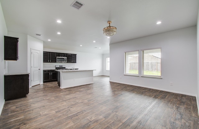 kitchen with visible vents, open floor plan, recessed lighting, and stainless steel appliances
