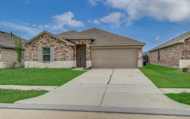 view of front of home with a garage, a front lawn, roof with shingles, brick siding, and concrete driveway