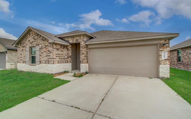 view of front of house featuring a garage, concrete driveway, a front lawn, and stone siding