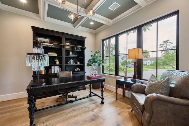 office area with ornamental molding, light wood finished floors, beamed ceiling, coffered ceiling, and baseboards
