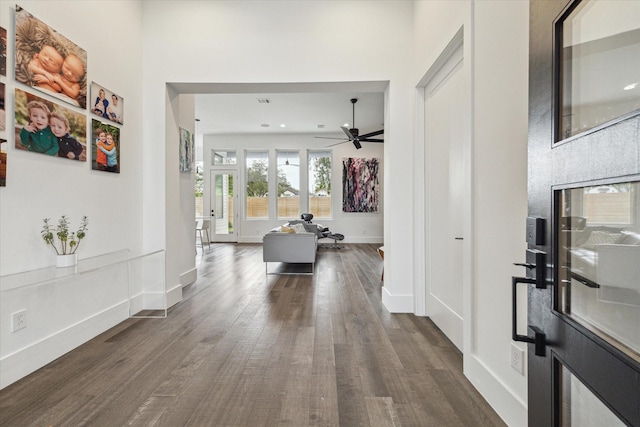 foyer with baseboards, ceiling fan, recessed lighting, and dark wood-type flooring