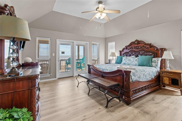 bedroom with access to outside, vaulted ceiling, light wood-type flooring, and ceiling fan