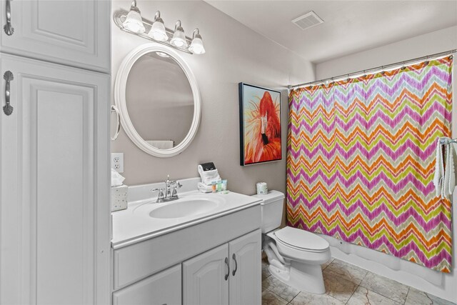 full bathroom with visible vents, shower / bath combo with shower curtain, toilet, and vanity