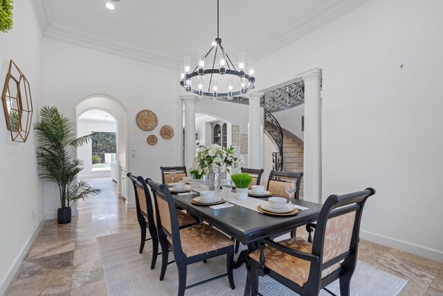 61 Open Sands Ct, Sugar Land, TX 77479 - dining space featuring stairs, arched walkways, baseboards, and a notable chandelier