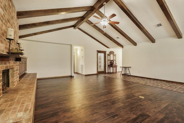 unfurnished living room featuring a ceiling fan, visible vents, a brick fireplace, wood finished floors, and baseboards