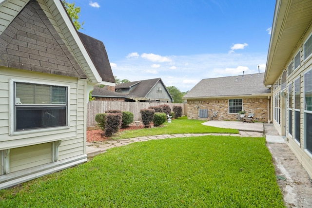 view of yard with a patio and fence
