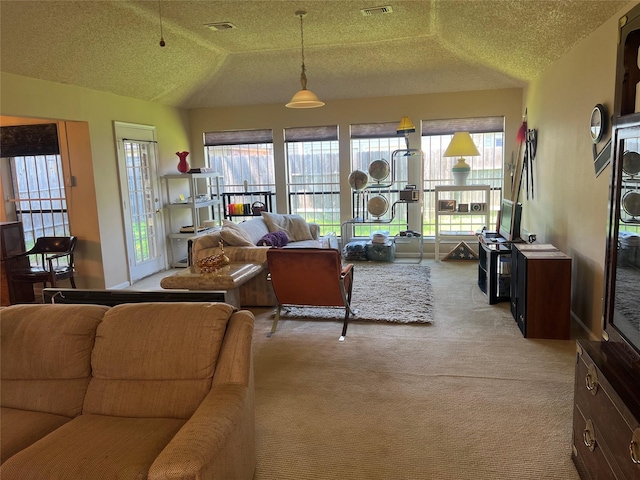 11726 Pecan Creek Dr, Houston, TX 77043 - living room with light colored carpet, a textured ceiling, and vaulted ceiling