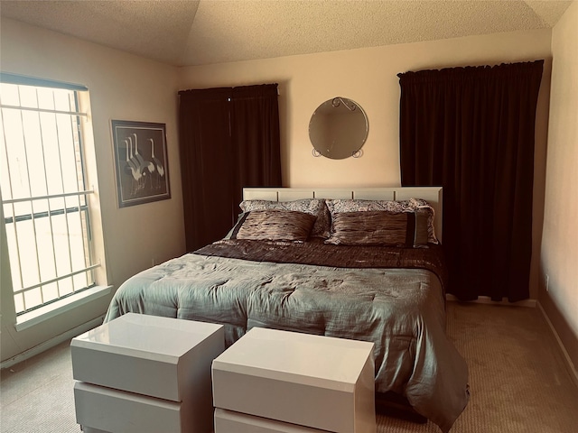 11726 Pecan Creek Dr, Houston, TX 77043 - bedroom featuring light colored carpet and a textured ceiling