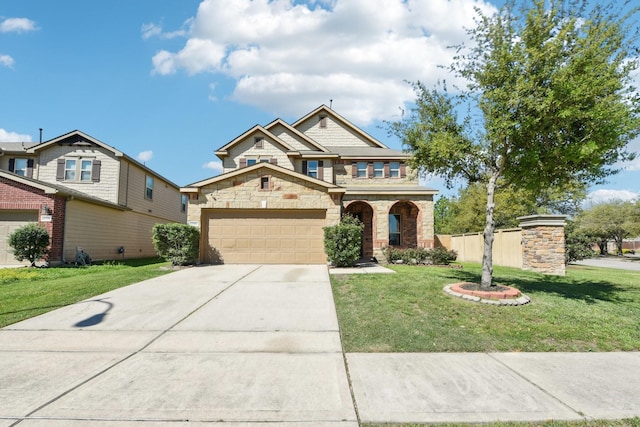 traditional home with a garage, stone siding, driveway, and a front yard