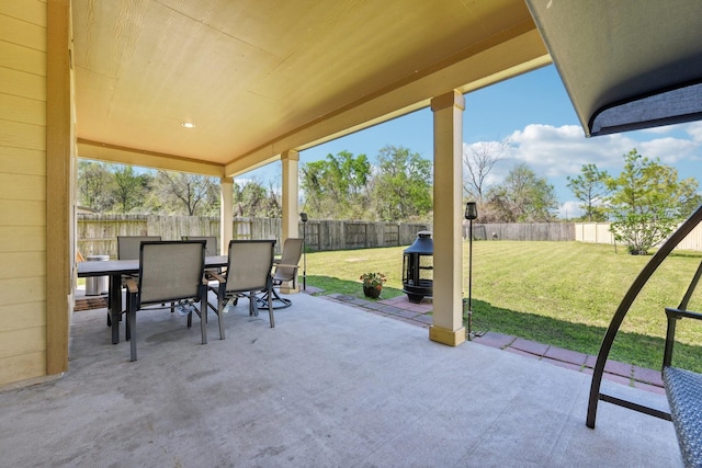 view of patio / terrace featuring a fenced backyard and outdoor dining area