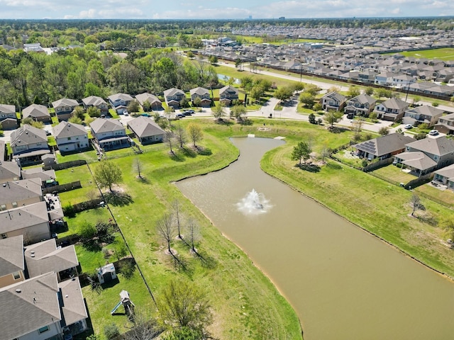 birds eye view of property featuring a residential view and a water view