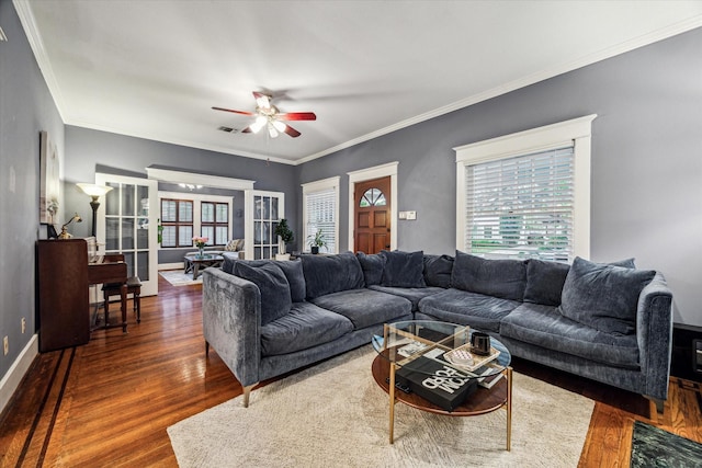 living room featuring french doors, a ceiling fan, wood finished floors, and ornamental molding
