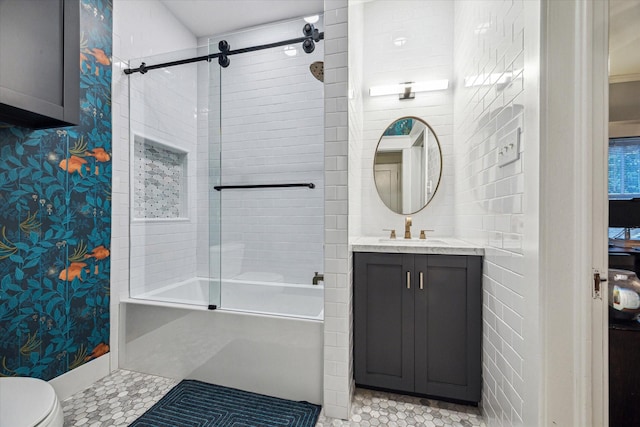 bathroom featuring toilet, tub / shower combination, tile patterned flooring, and vanity