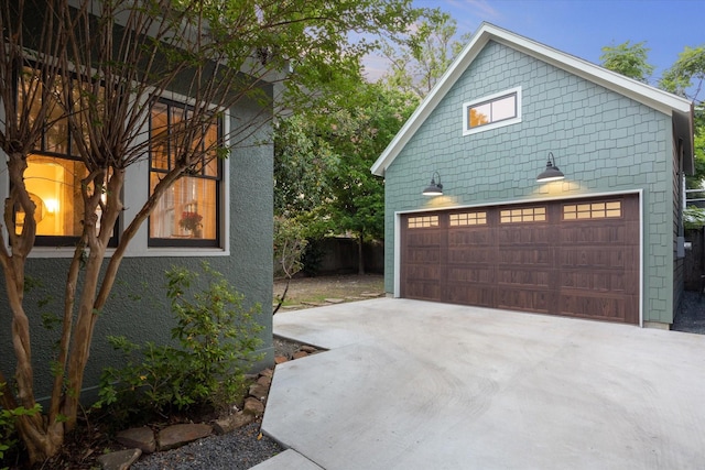 view of property exterior featuring a garage
