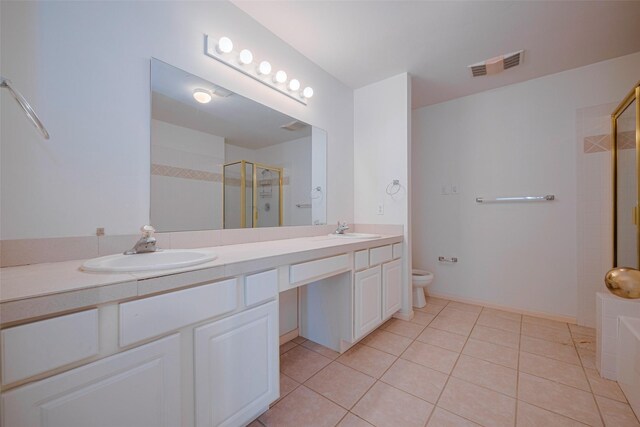 full bathroom with a sink, double vanity, tile patterned floors, visible vents, and a stall shower