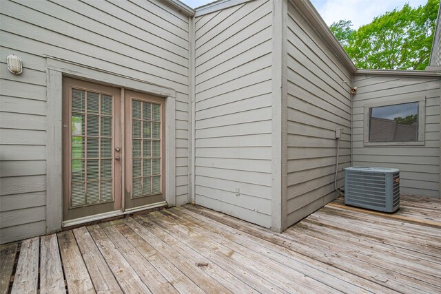 wooden deck featuring central AC