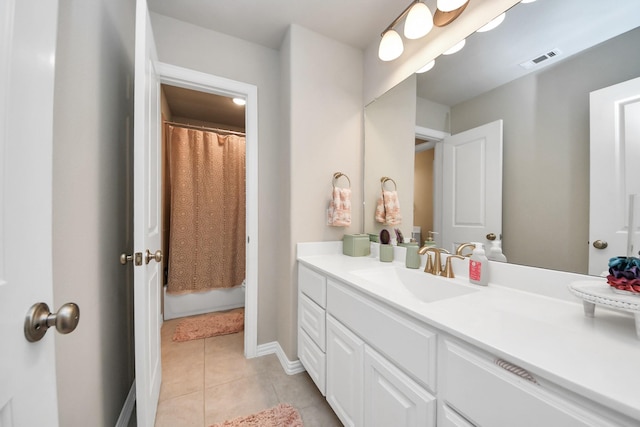 bathroom featuring a shower with curtain, tile patterned floors, visible vents, and vanity