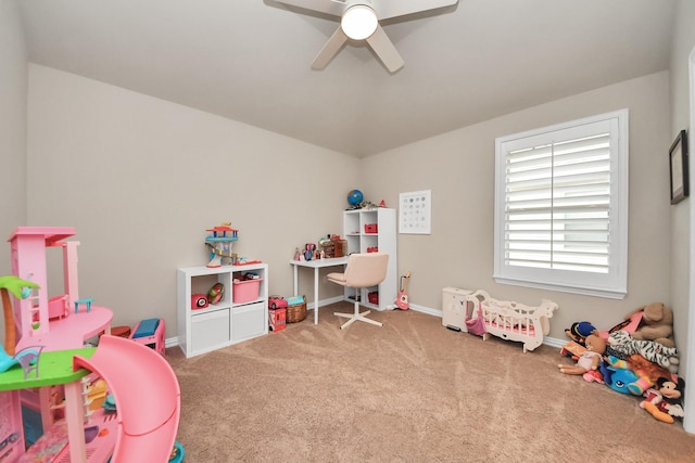 game room with carpet floors, baseboards, and ceiling fan