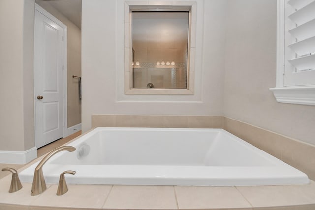 full bathroom featuring a bath
