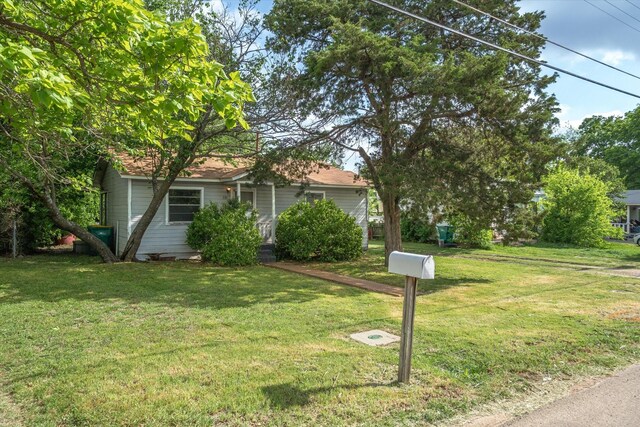 331 Hickerson St, Cedar Hill, TX 75104 - view of home's exterior with a lawn