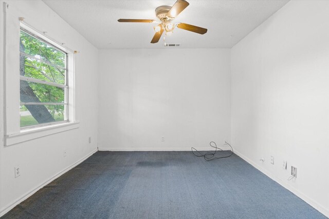 331 Hickerson St, Cedar Hill, TX 75104 - unfurnished room featuring baseboards, ceiling fan, visible vents, and dark carpet